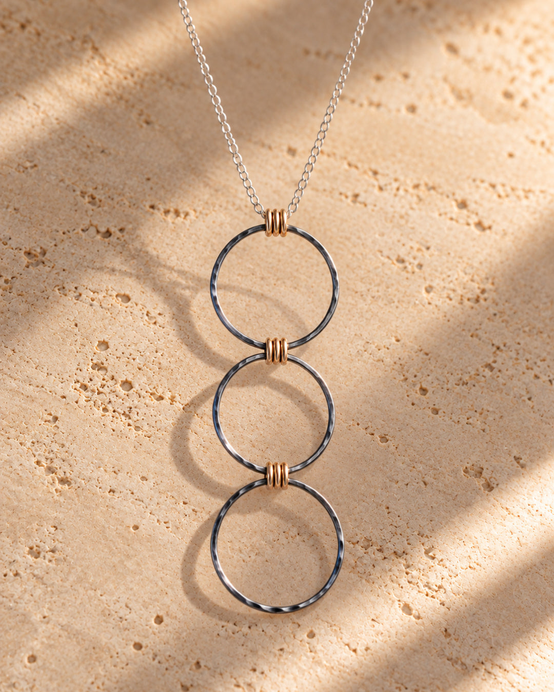 Linear Luxe Day Edition Necklace with three oxidized Argentium silver circles and gold-filled accents