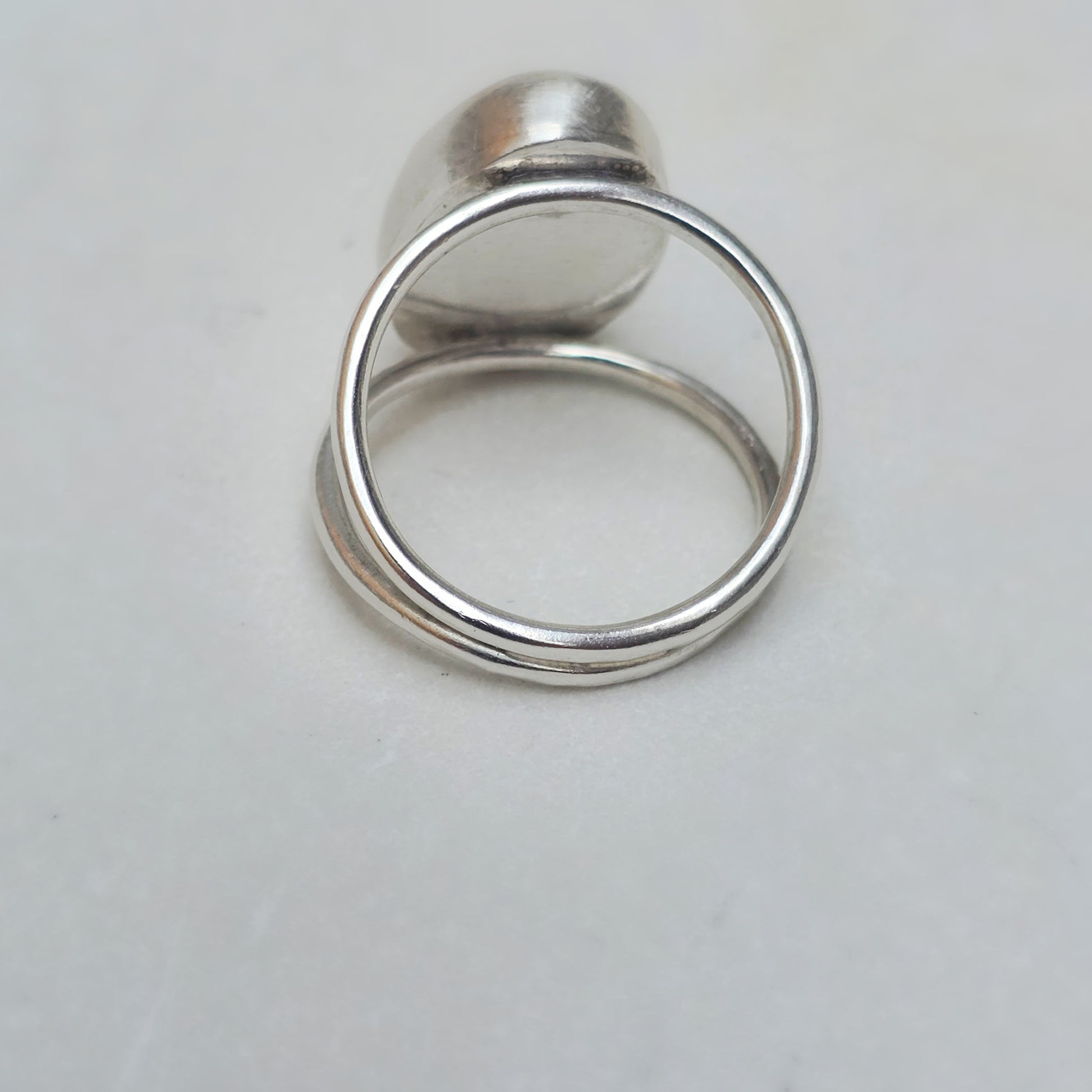 Backside view of handmade Argentium split shank band.