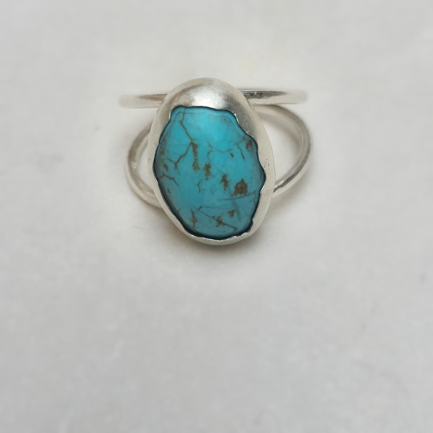 Voice of the Sky Turquoise Ring flatlay front view.