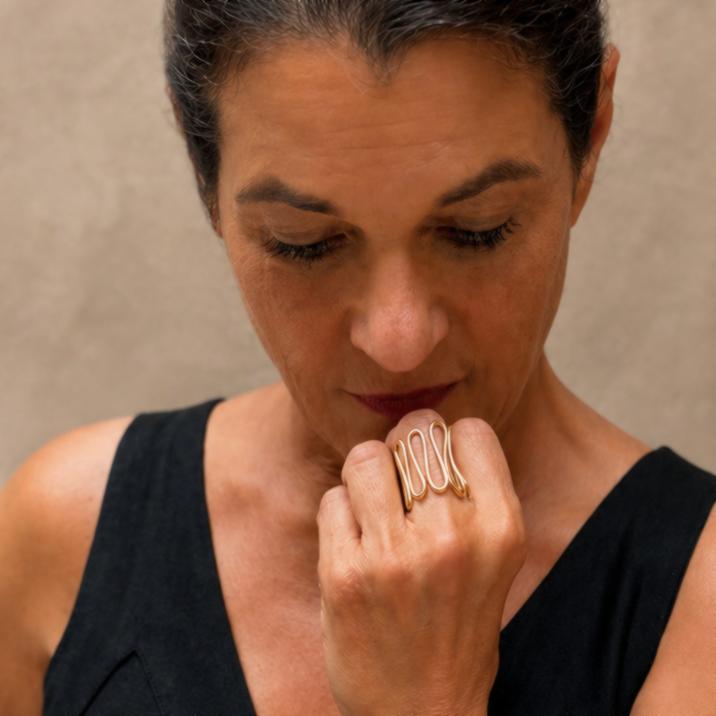 Close-up of Aegis Ring on model, modern sculptural gold ring by Lepa Jewelry