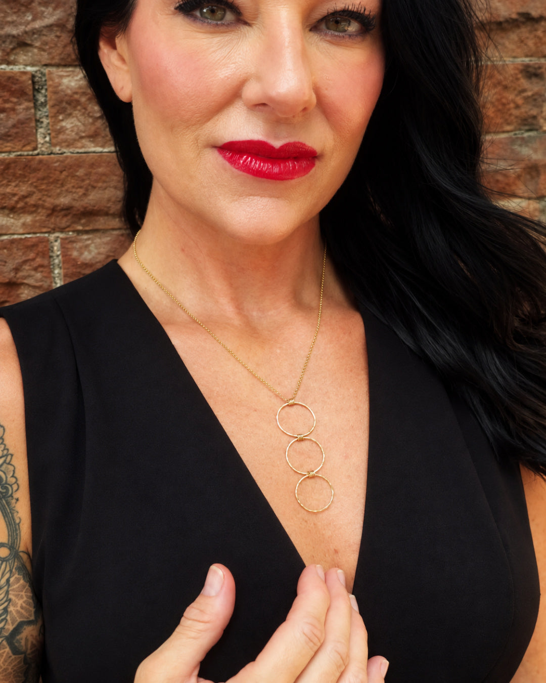 Linear Luxe Day Edition Necklace in gold-filled worn with a black V-neck top