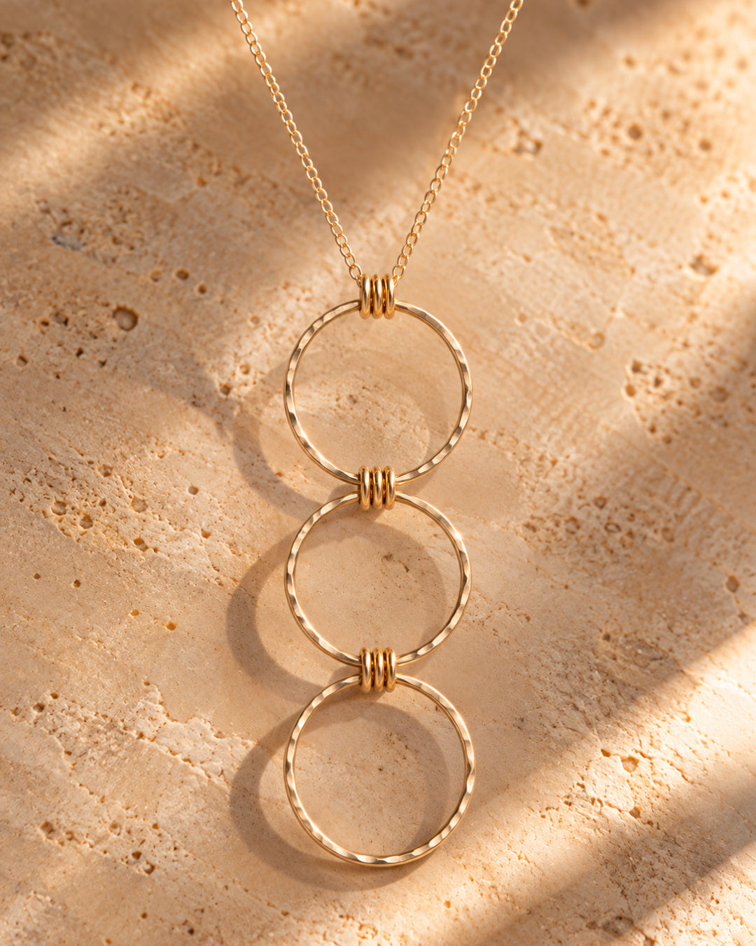 Linear Luxe Day Edition Necklace in gold-filled with three lightly hammered linked circles